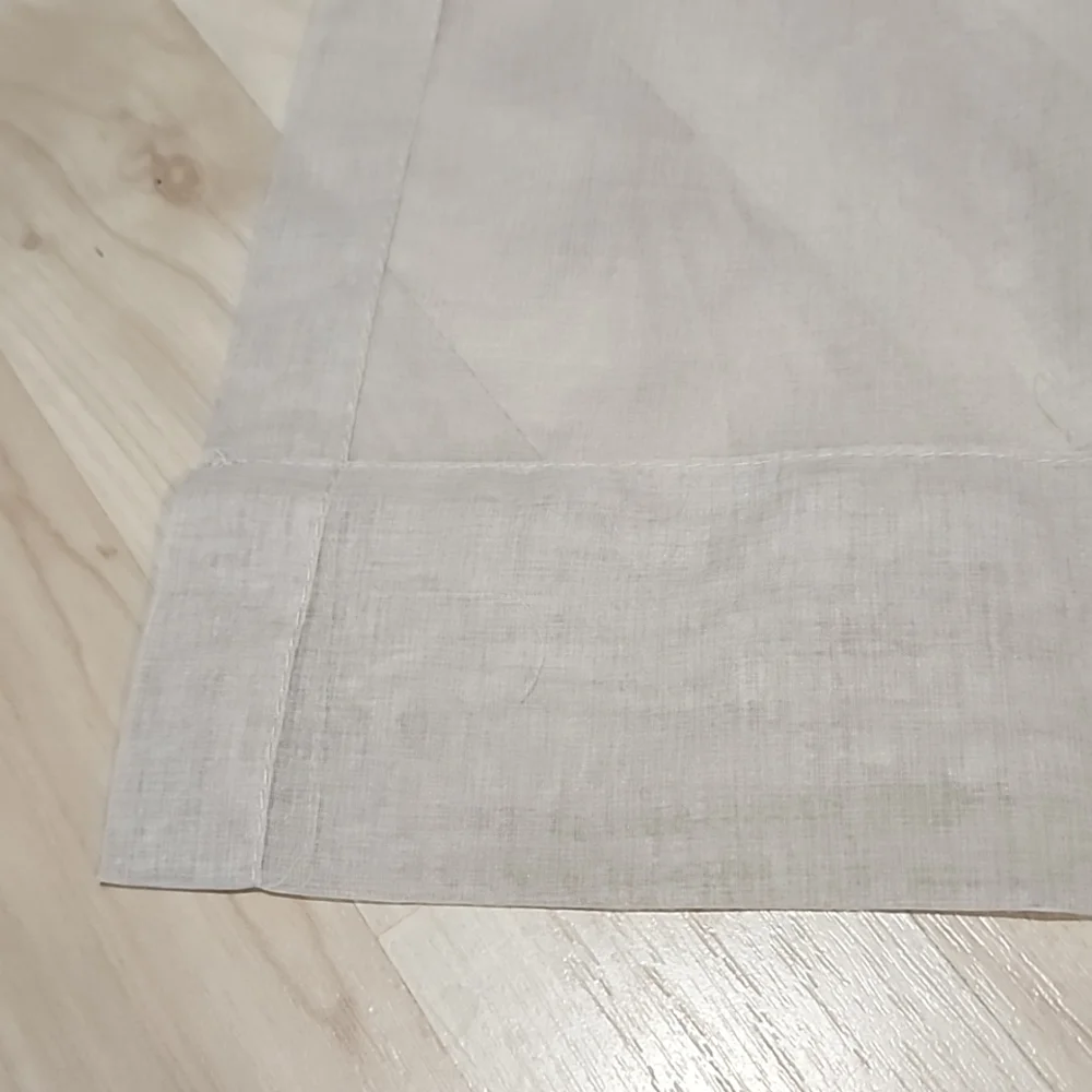 4 Sheer tan curtain panels with button loop top